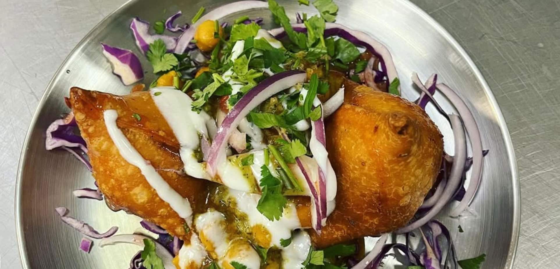 Samosa chaat at Haveli Indian Cuisine in North Conway, topped with yogurt, chutneys, onion and cilantro
